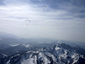 Paragliding on a winter day over the Brauneck